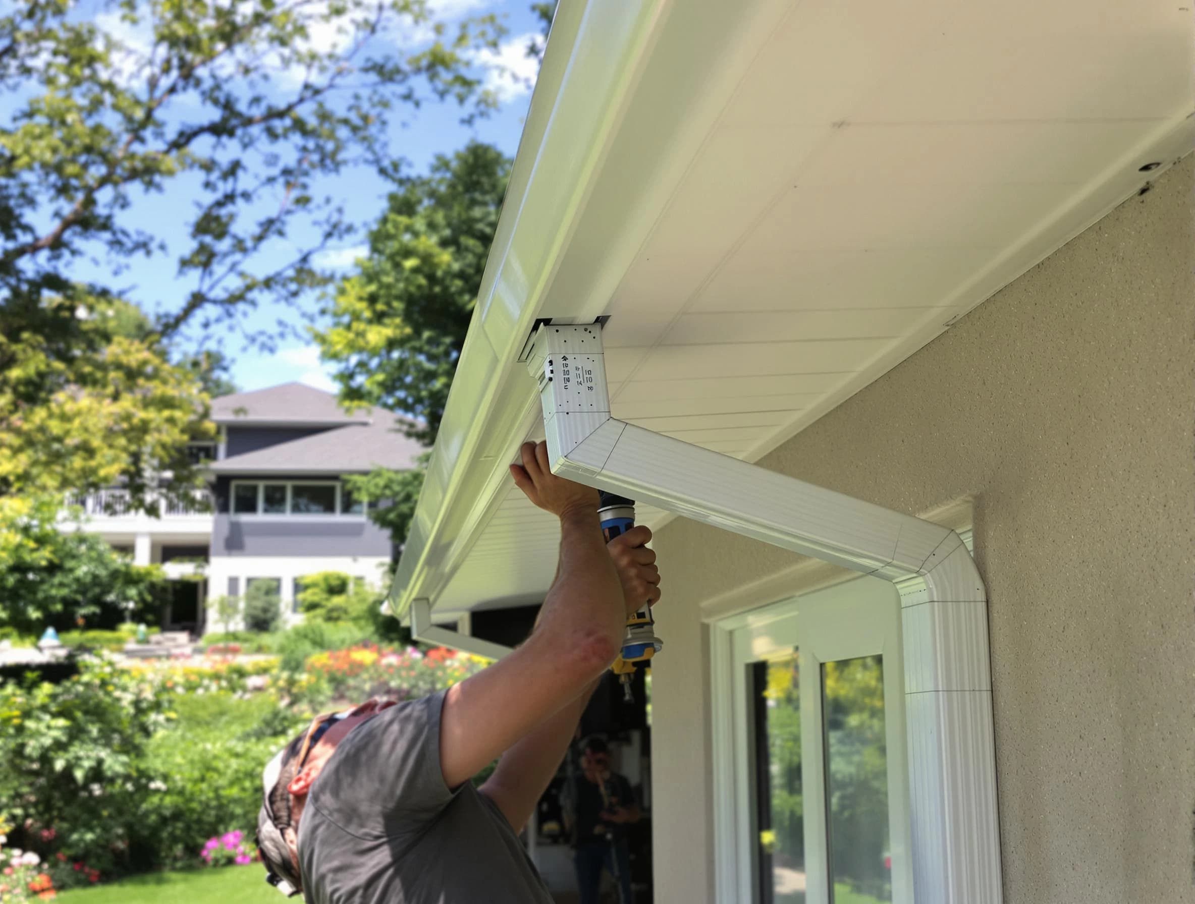 Medina Roofing Company technicians performing gutter installation in Medina, OH